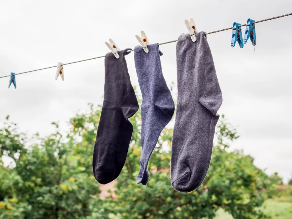 wet socks on close line